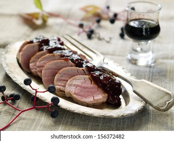 Roasted Pork Tenderloin Served With Sauce, Selective Focus