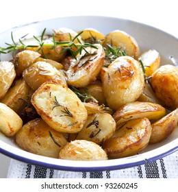 Roasted Potatoes With Rosemary, In Old Enamel Bowl.