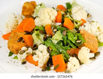 Roasted Pumpkin And Onion Salad With Wilted Spinach And Toasted Almonds. 