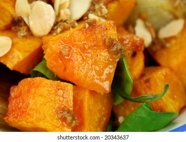 Roasted Pumpkin And Onion Salad With Wilted Spinach And Toasted Almonds.