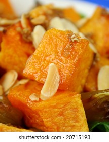 Roasted Pumpkin And Onion Salad With Wilted Spinach And Toasted Almonds.