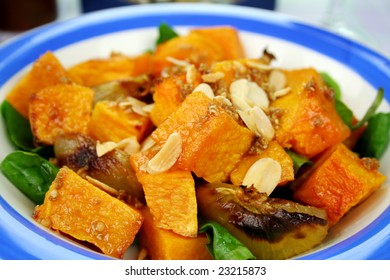 Roasted Pumpkin And Onion Salad With Wilted Spinach And Toasted Almonds.