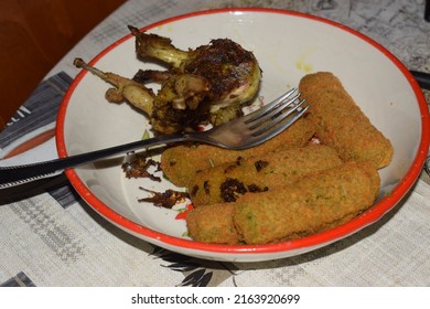 Roasted Quail Served With Breaded Veggie Sticks On The Side