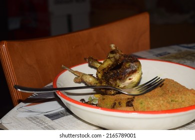 Roasted Quail Served With Breaded Veggie Sticks On The Side