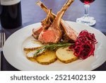 roasted rack of lamb with potatoes and roasted red cabbage