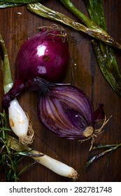 Roasted Red Onion On Dark Wooden Background