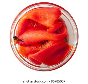 Roasted Red Peppers In Glass Bowl, Shot From Directly Above And Isolated On White.