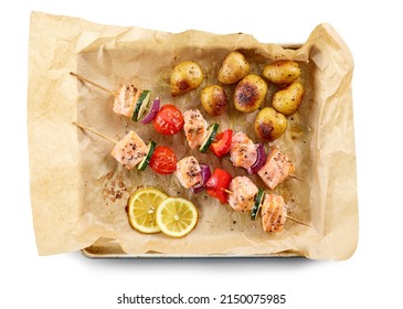 Roasted Salmon And Vegetable Skewers On Oven Pan Isolated On White Background, Top View