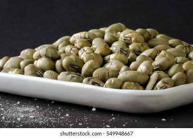 Roasted And Salted Edamame On A Plate