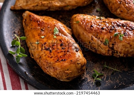 Roasted or seared chicken breast with herbs and spices