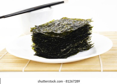 Roasted Seaweed Snack On White Plate