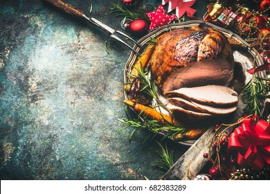 Roasted Sliced Christmas Ham On Festive Table Background With Decoration, Top View