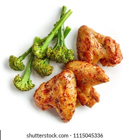 Roasted Spicy Chicken Wings With Broccoli Isolated On White Background