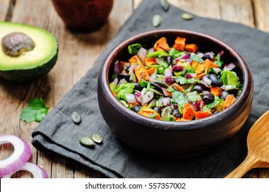 Roasted Sweet Potato Black Bean Pepita Avocado Salad. Toning. Selective Focus