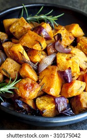 Roasted Sweet Potato With Red Onion And Rosemary.