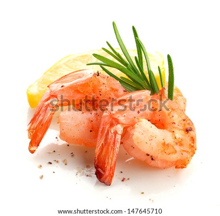 Roasted tails of shrimps with fresh rosemary and lemon