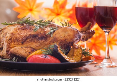 Roasted Thanksgiving Turkey On Restaurant Table With Wine