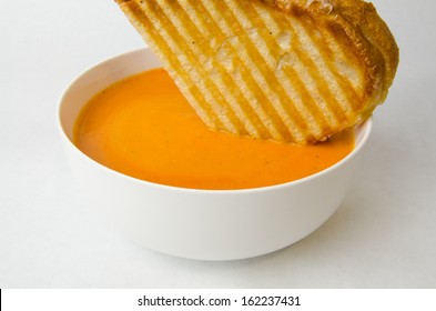 Roasted Tomato, Red Pepper, And Basil Soup With Grilled Cheese Sandwich