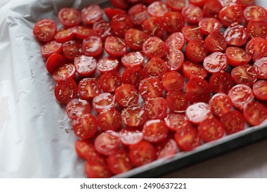 Roasted Tomatoes in Olive Oil,dry small tomatoes,cooking process,canned food,healthy home cooking,italian,spice,small tomato in an oven,colorful food,zen eating,diet,food in a jar - Powered by Shutterstock