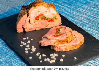 Roasted Turkey Meat Roll With Fills On Black Slate Plate