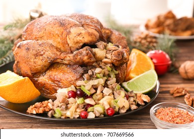 Roasted Turkey With Stuffing Served On Holiday Table