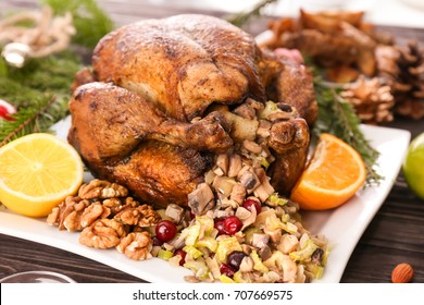 Roasted Turkey With Stuffing Served On Holiday Table