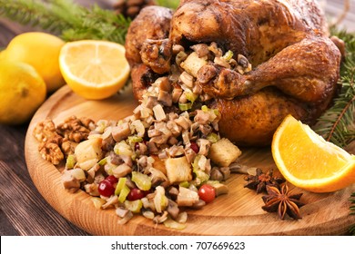 Roasted Turkey With Stuffing Served On Holiday Table