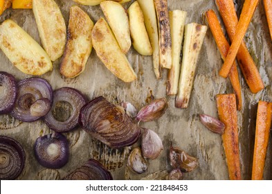 Roasted Vegetable, Potato, Onion, Garlic, Carrots, Parsnip On Kitchen Paper