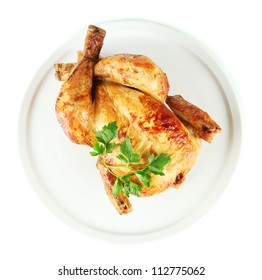 Roasted Whole Chicken On A White Plate Isolated On White