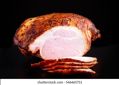 Roasted Whole Sliced Ham On Dark Background