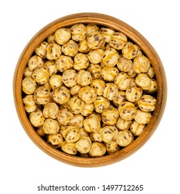 Roasted Yellow Chickpeas In Wooden Bowl. Crispy Snack, Vegan, High Protein Source, Made Of Cooked Chick Peas. Isolated Macro Food Photo, Closeup, From Above, On White Background.