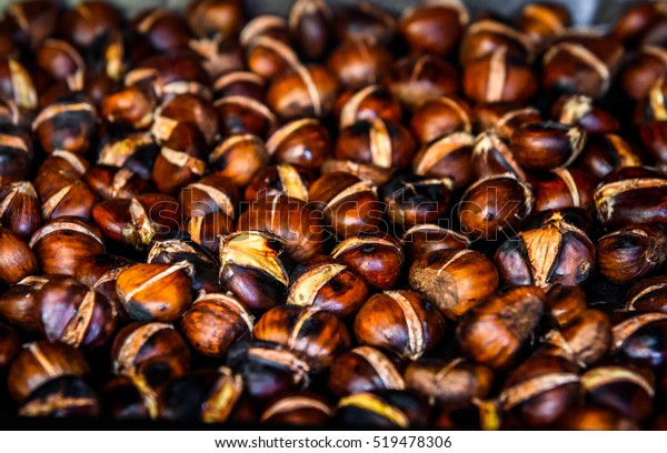 Roasting Grilled Chestnuts On Barbecue Flames Royalty Free Stock