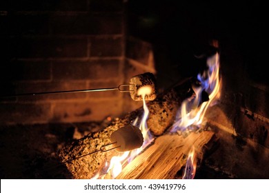 Roasting Marshmallows Over A Fire For Smores Indoors