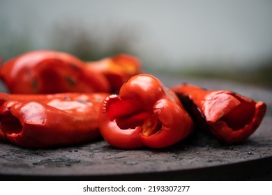 roasting paprika for winter provisions red organic peppers on the stove oven to be turned into ajvar a tasty spread popular in the Balkans Serbia Macedonia Bosnia and Croatia