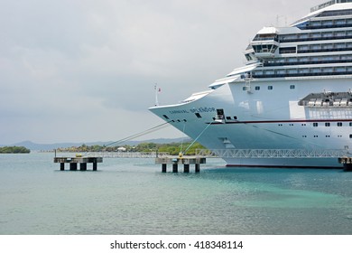 ROATAN, HONDURAS- APRIL 12, 2016: Big Docked Cruise Liner- Carnival Splendor