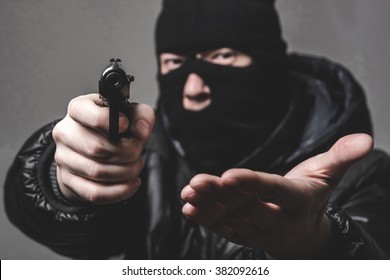 Robber With An Aming Gun