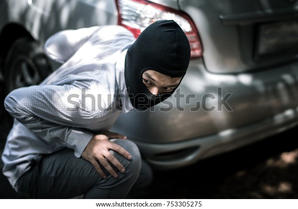 Download Robber Black Mask Car Robbery Crime Stock Photo Edit Now 753305275 Yellowimages Mockups