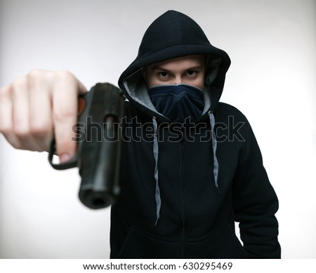 Robber with a gun