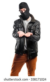 Robber holding something