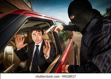 Robbery Of The Businessman In Its Car