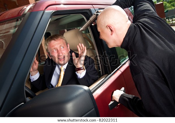 Robbery of the businessman
in its car