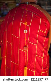 The Robe Of The Chinese Priest.