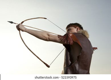 Robin Hood. Young Archer In Vintage Clothes With Arrow And Long Bow