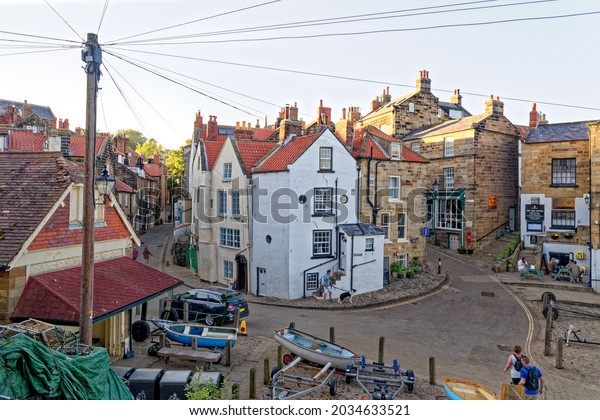 Robin Hood\'s Bay -\
small fishing village and a bay in in the North York Moors National\
Park. Robin Hood Bay village street scenes - North Yorkshire,\
England - 14th of July\
2021