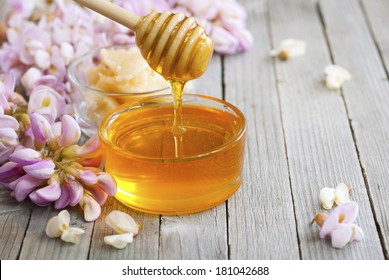 Robinia Honey With Acacia Blossoms On Wooden Table