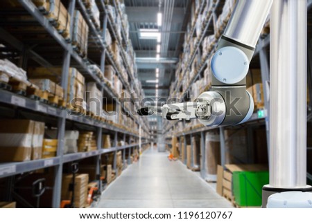 Roboric arm in warehouse