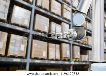 Roboric arm in warehouse