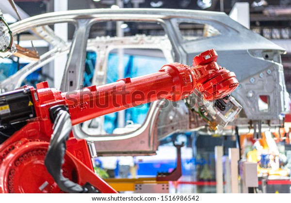 robot arm in automobile\
factory