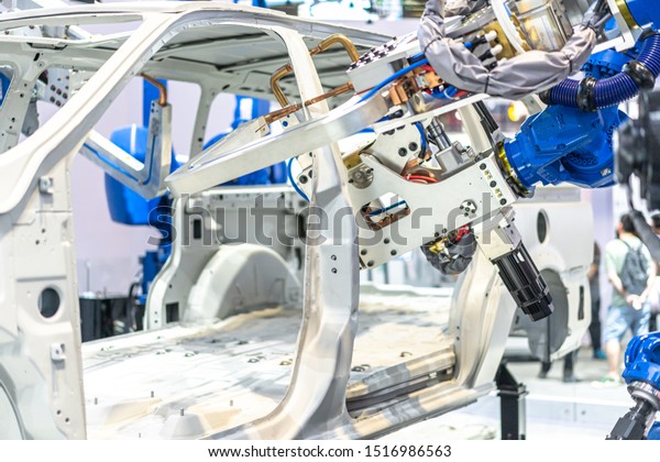 robot arm in automobile\
factory