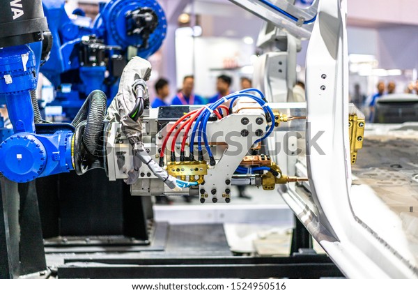 robot arm in automobile\
production line